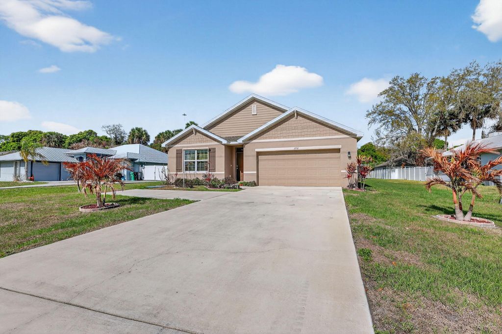 Photo of 1732 SW Import Drive, Port Saint Lucie, FL 34953 (MLS # B26001976)