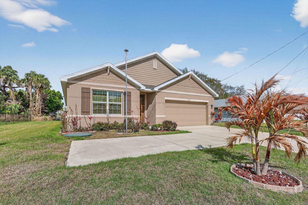 Photo of 1732 SW Import Drive, Port Saint Lucie, FL 34953 (MLS # B26001976)