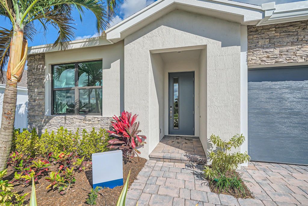 Photo of 1893 NE Ocean Dunes Drive, Jensen Beach, FL 34957 (MLS # R10935552)