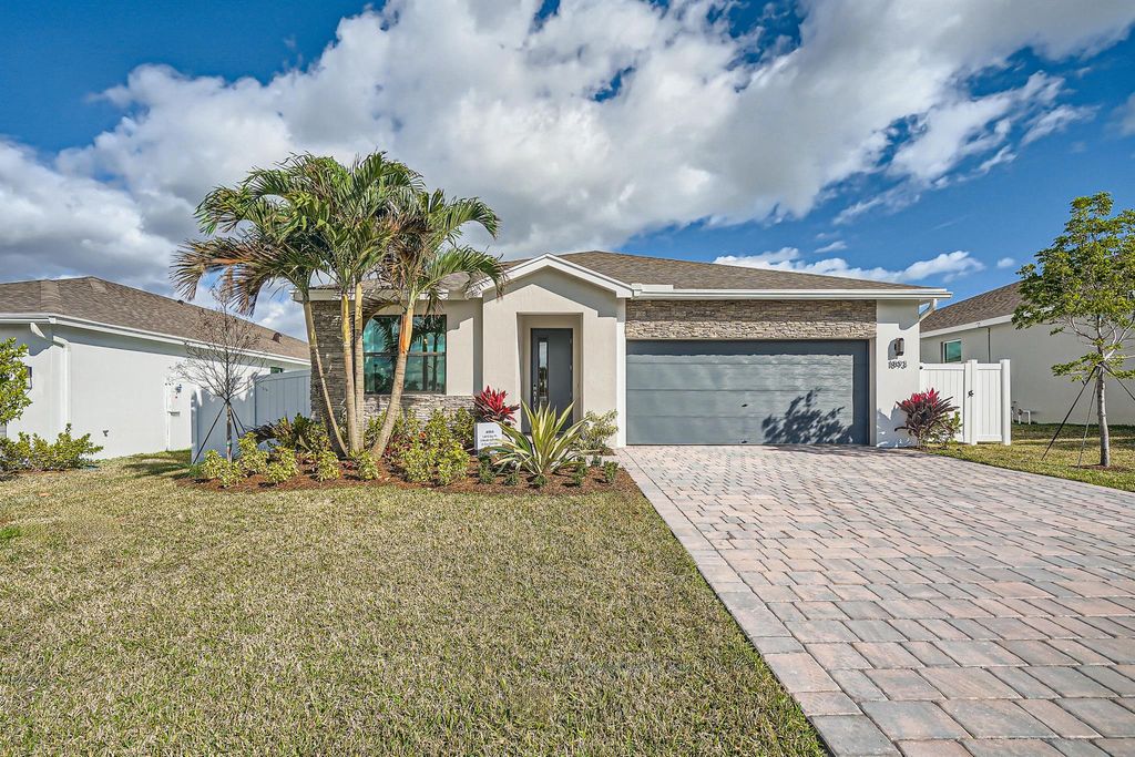 Photo of 1893 NE Ocean Dunes Drive, Jensen Beach, FL 34957 (MLS # R10935552)