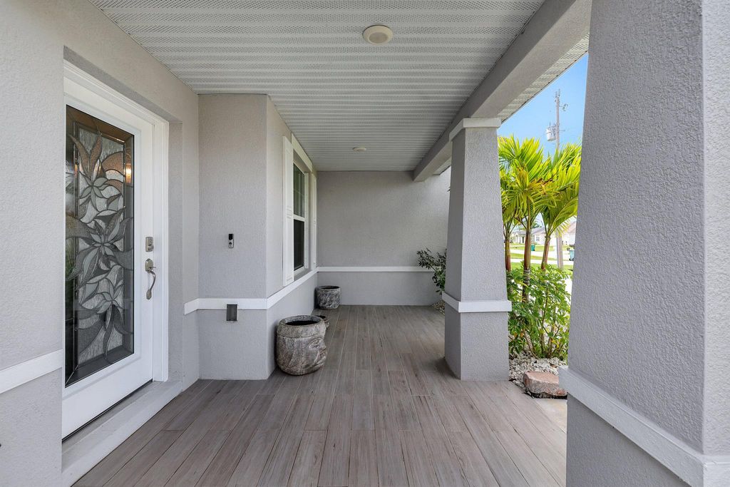 Photo of 5774 NW Belwood Circle, Port Saint Lucie, FL 34986 (MLS # R10965329)