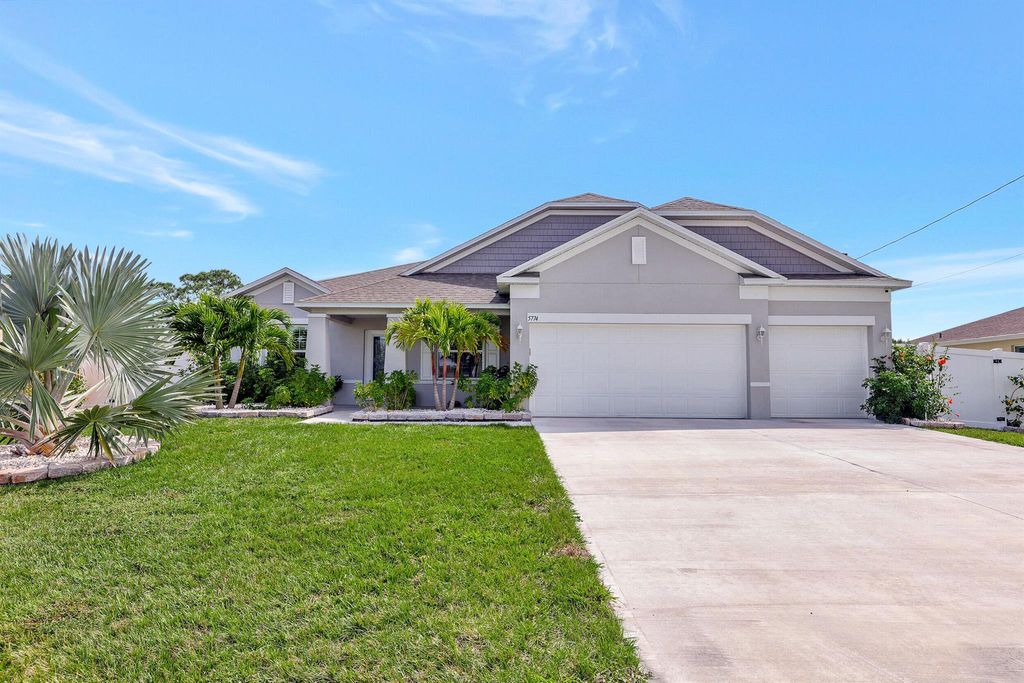 Photo of 5774 NW Belwood Circle, Port Saint Lucie, FL 34986 (MLS # R10965329)