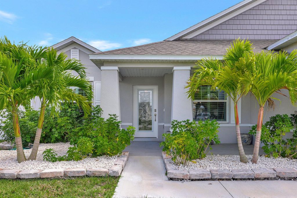 Photo of 5774 NW Belwood Circle, Port Saint Lucie, FL 34986 (MLS # R10965329)
