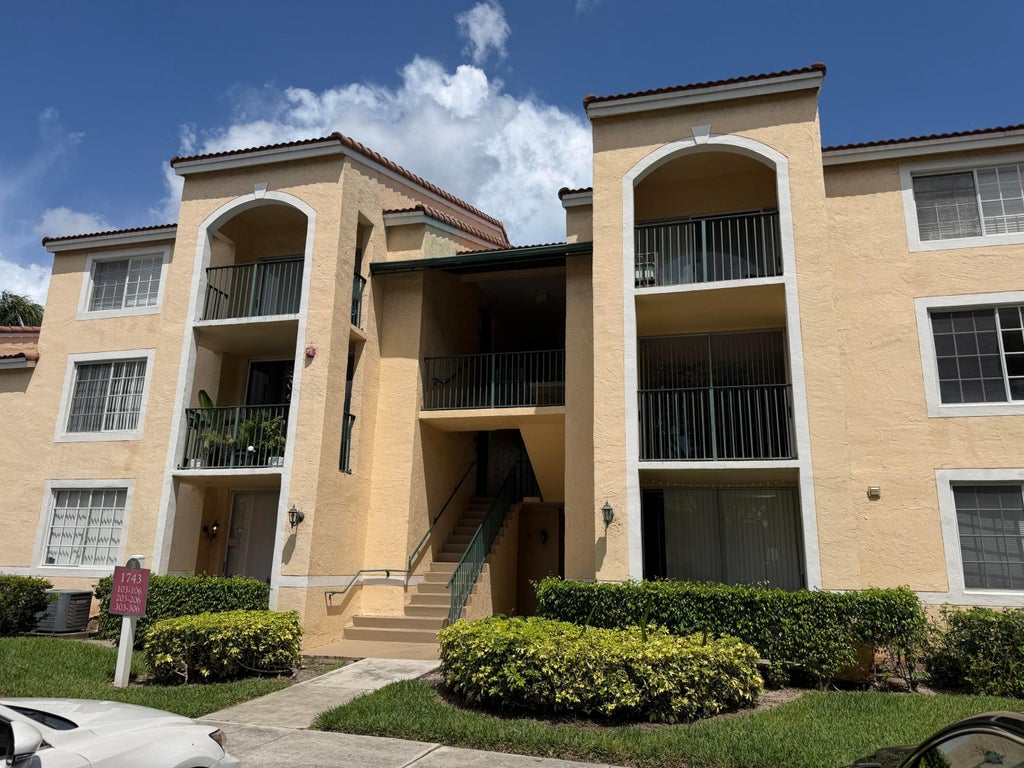 Photo of 1743 Village Boulevard #106, West Palm Beach, FL 33409 (MLS # B26054265)