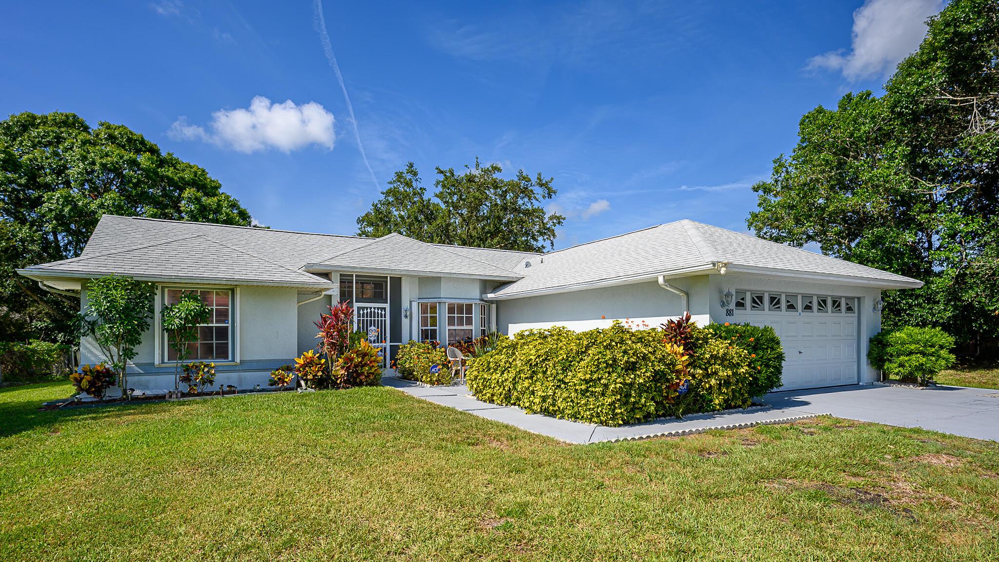 Welcome to this beautifully maintained home in the heart of Sebastian! Featuring a 2023 roof, accordion hurricane shutters, and a freshly painted interior and driveway. Inside, you'll find tile flooring throughout, high ceilings, spacious open layout that includes both a living room and family room. Updated kitchen w/ granite countertops & plantation shutters throughout. Enjoy a screened-in patio overlooking a fully fenced backyard. Equipped with an irrigation system, alarm system, and a 2-car garage. Great location close to parks, river, beaches and all that Sebastian has to offer!