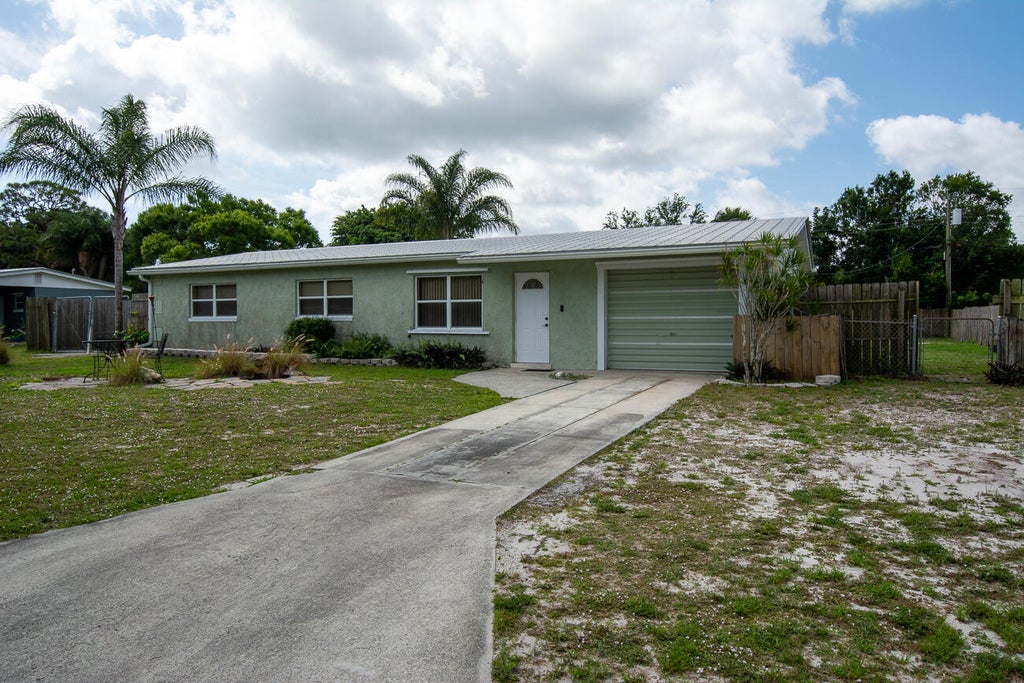 Photo of 337 Notlem Street, Fort Pierce, FL 34982 (MLS # R11078957)
