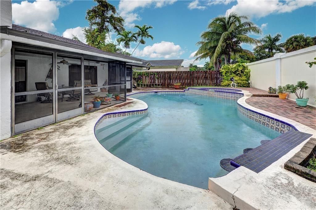 Photo of 7145 NW 49th Ct, Lauderhill, FL 33319 (MLS # F10542916)