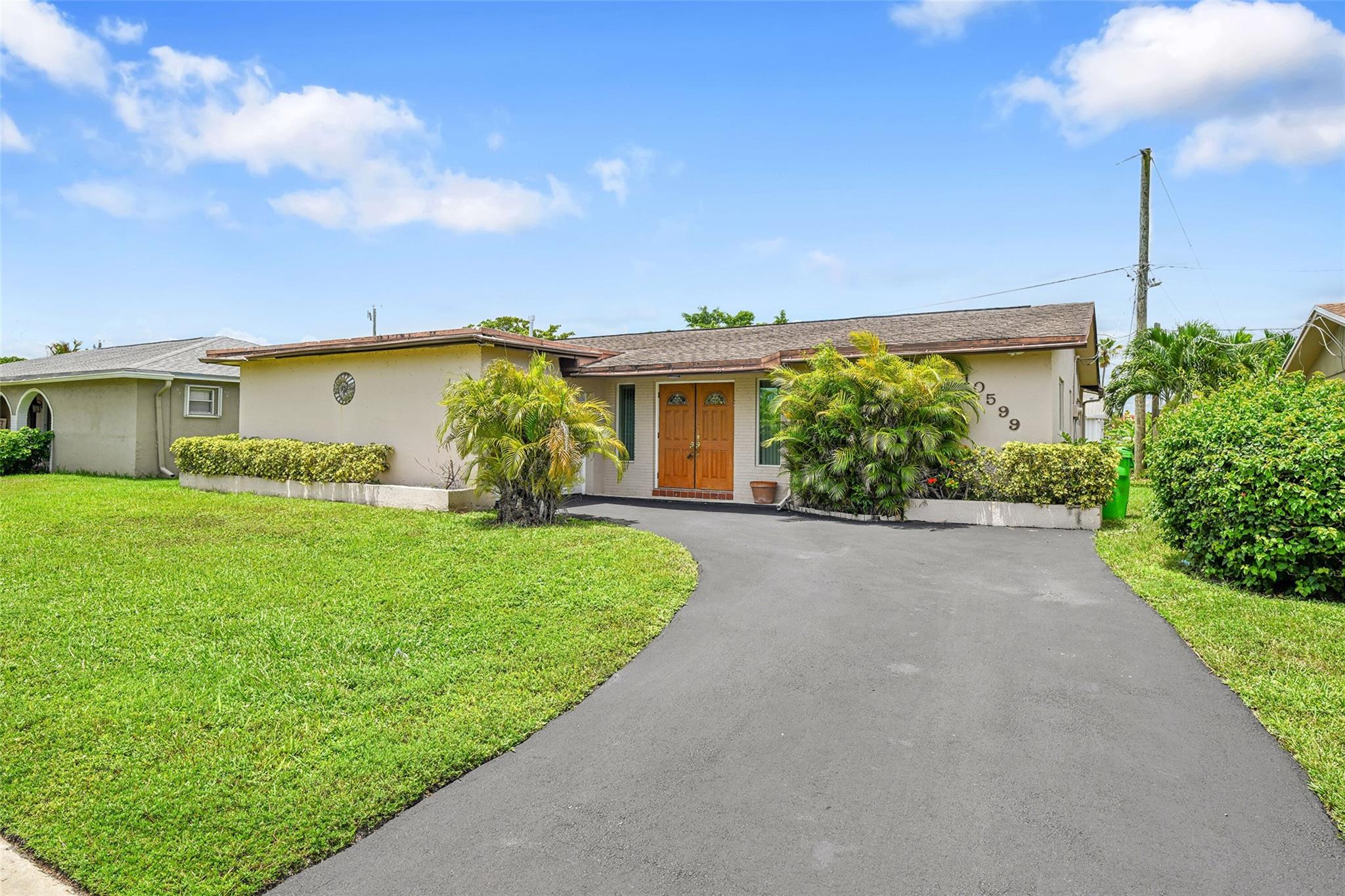 Opportunity knocks! Spacious 3-bed, 2-bath home in a quiet Sunrise neighborhood with an open-concept layout and split-bedroom floor plan. The granite kitchen features a gas range and flows into a bright living area and large sunroom—perfect for entertaining. Primary En-suite bedroom includes a large oversized closet. A versatile bonus room is ideal for a home office, hobby room, or additional bedroom. Enjoy a fully fenced backyard with screened patio, shed, and ample lawn space. Impact windows and doors provide peace of mind and comfort. Conveniently located near schools, shopping, dining, and major highways. Whether you're looking to customize your dream home or invest in a property with great potential, this one is a must-see!