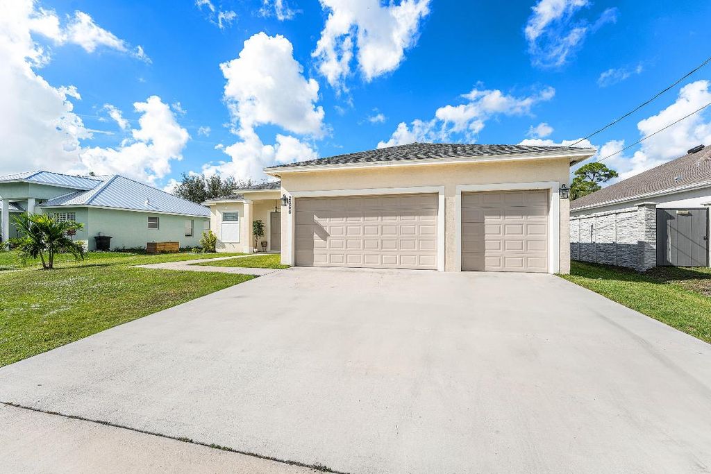 Photo of 2366 SW Blaine Terrace, Port Saint Lucie, FL 34953 (MLS # R11147094)