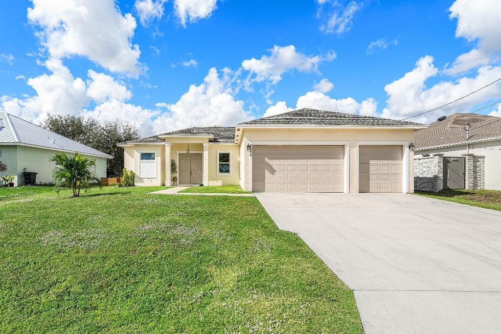 Photo of 2366 SW Blaine Terrace, Port Saint Lucie, FL 34953 (MLS # R11147094)