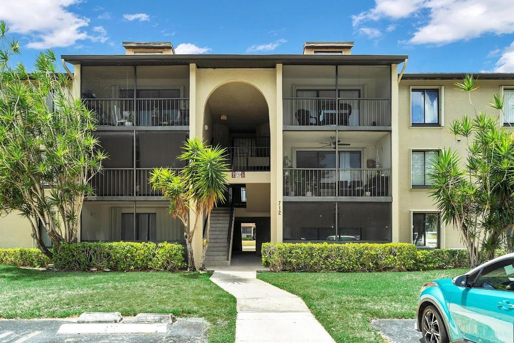 Photo of 712 Sunny Pine Way #D1, Greenacres, FL 33415 (MLS # R11152586)