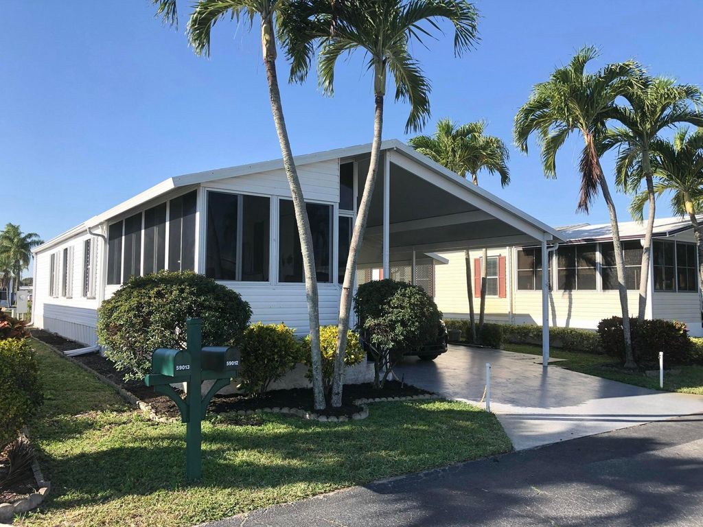 Photo of 59012 Captiva Bay, Boynton Beach, FL 33436 (MLS # R11161893)