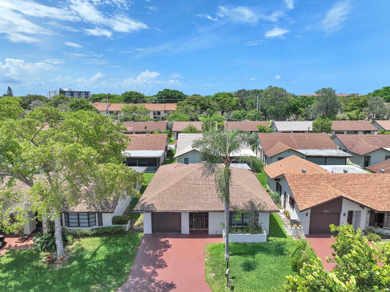 Beautifully remodeled single-family 55+ Deerfield Beach gem with garage! This gorgeous turnkey home features modern finishes, open & bright living spaces, sleek kitchen, and updated baths. Move-in ready with impeccable detail—ideal for seasonal or year-round living. Prime location near shopping, dining, beaches & highways. A must-see!