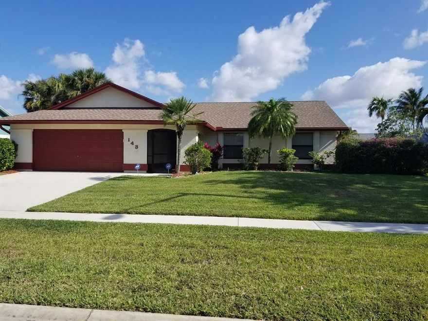 Great pool home with large screen room for entertaining. Fenced back and side yard. All wood cabinets with rolling island , granite tops. Large living and master bedroom. Master bath has a whirlpool tub all tile. New carpet in both guest rooms. Home has all hurricane shutters, Move in ready.