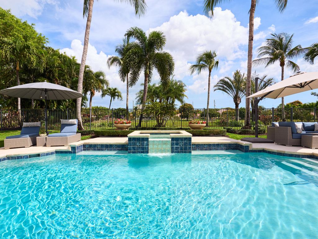 Photo of 3700 Embassy Drive, West Palm Beach, FL 33401 (MLS # R11157361)