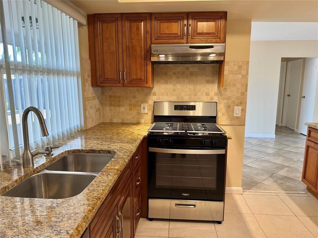 Photo of 11741 NW 30th Place, Sunrise, FL 33323 (MLS # B26009554)