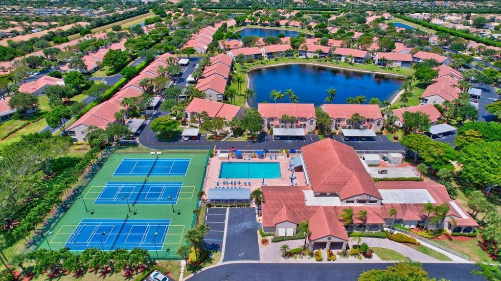 Photo of 7922 Sandy Pointe Drive, Delray Beach, FL 33446 (MLS # B26046835)