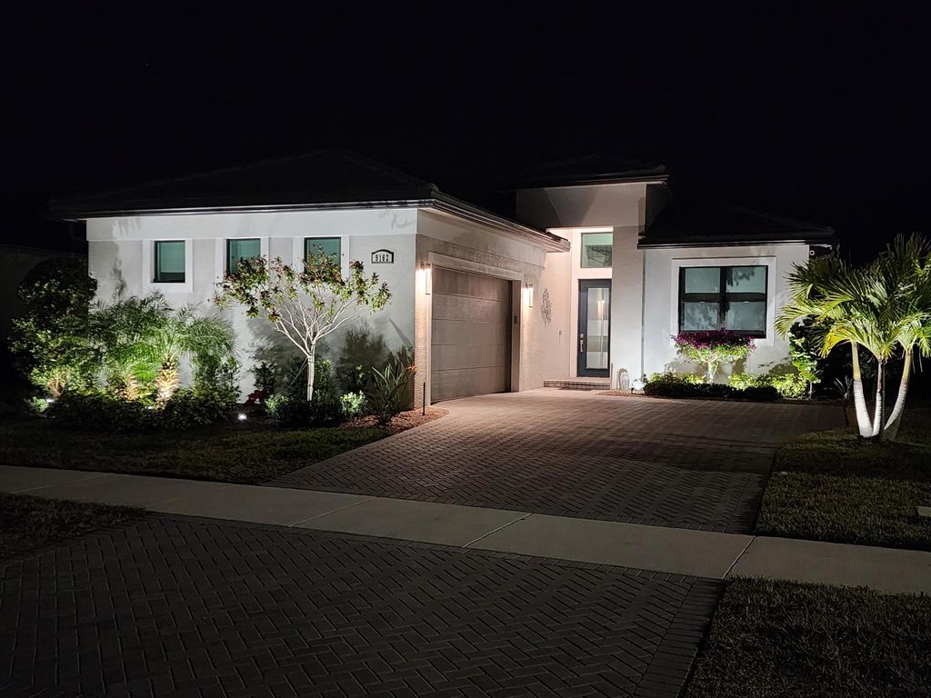 Photo of 9162 SW Arco Way, Port Saint Lucie, FL 34987 (MLS # R11121423)