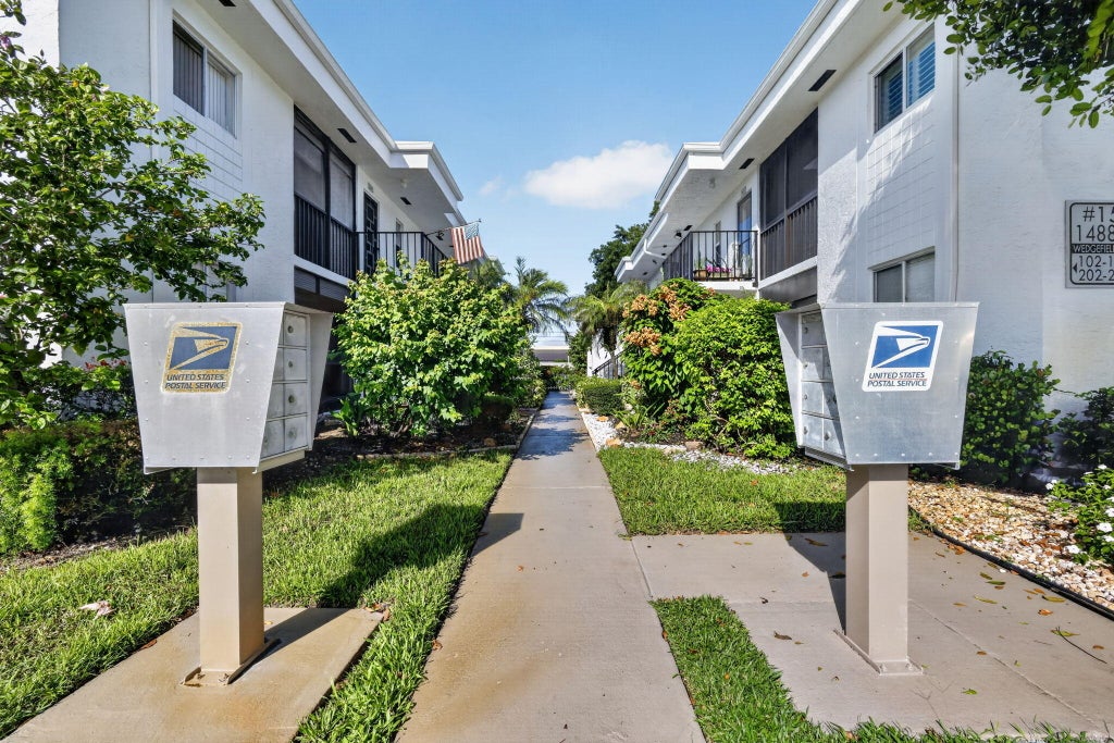 Photo of 14881 WEDGEFIELD Drive #103, Delray Beach, FL 33446 (MLS # B26080155)