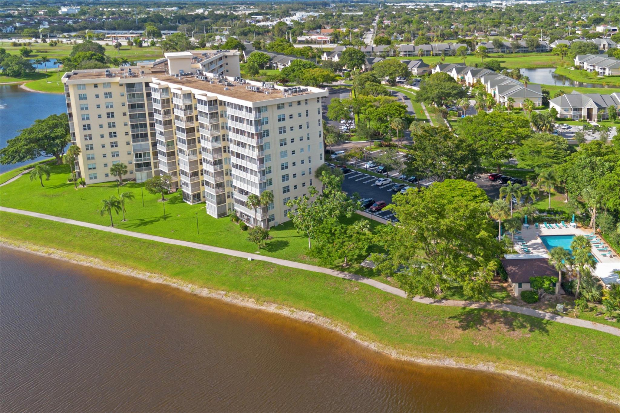 Pompano Beach is on fire and people are flocking to Palm Aire. Whether downsizing or making your first purchase, this Palm Aire residence is the size of most east side homes at a fraction of the price. At 1710 Sq. Ft. plus an enclosed patio for extra living space, this elegant home is ready for it's next relationship. Fine details abound from the tasteful hardwood floors, to the plantation shutters on the impact windows to the renovated kitchen, you will feel instantly enveloped in the warmth of home. A stable building with reserves the association fees are reasonable and the building immaculate. Flip through the photos, take a visual tour and then come to see this home priced to sell in today's market.