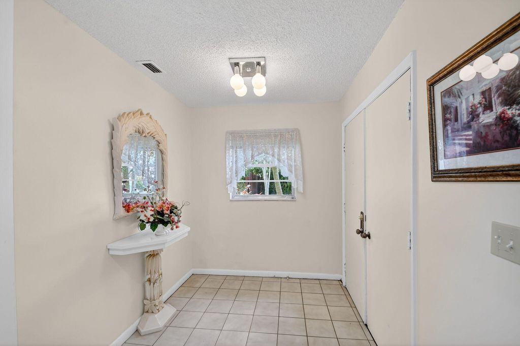 Photo of 6730 Starkeys Place, Lake Worth, FL 33467 (MLS # R11161041)