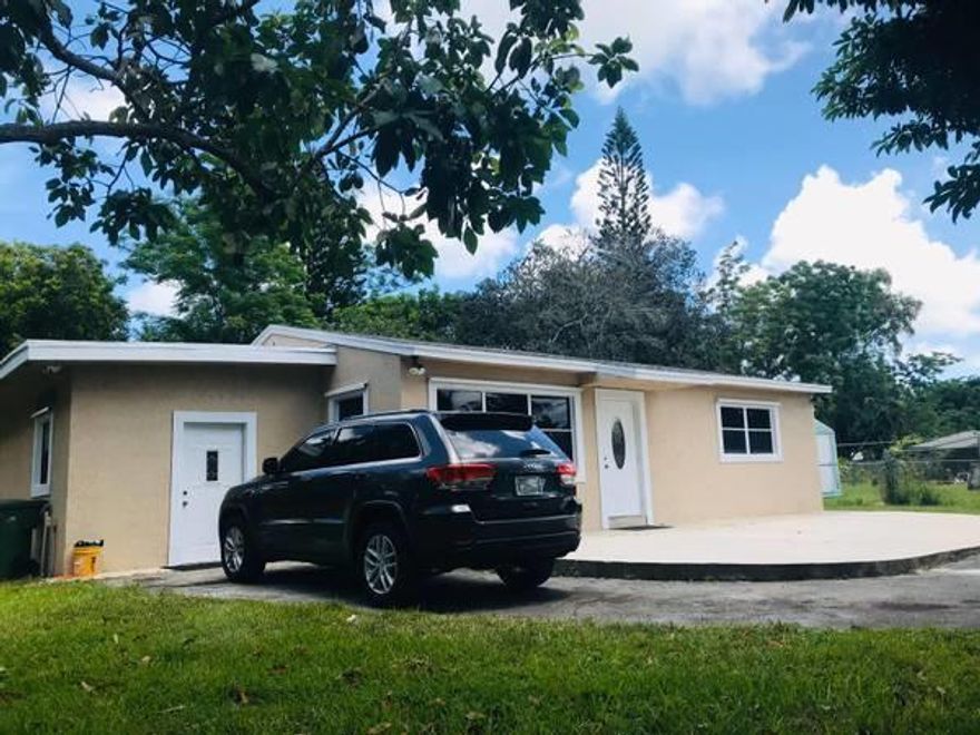 Large 0.5 Acre Property with 3 bedrooms 2 baths, 1,500 sq ft Inside Home. Renovated Single Family home with Utility/Laudry room with Spacious Front and Back Patio. Strategically Located close to Commercial shopping Stores area. Also close to Turnpike and I95. Good Solid House with NO HOA, Great start home for first time home buyers. Large front patio with plenty of parking space and fruit trees. Tenant occupied set appointments 24hr in advance via ShowingTime. This is one of few half acre properties with plenty of space to develop a larger home.