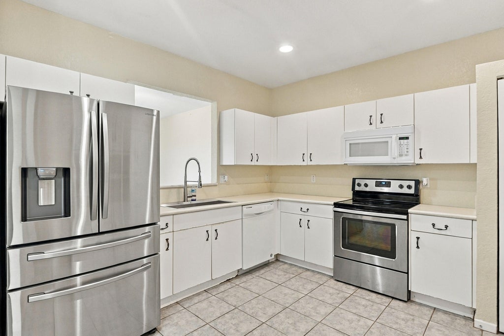 Photo of 5477 NW 90th Terrace, Sunrise, FL 33351 (MLS # B26086154)
