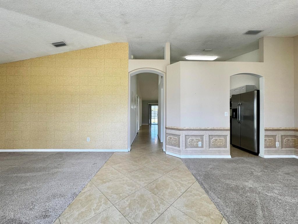 Photo of 484 SW Columbus Drive, Port Saint Lucie, FL 34953 (MLS # R11112958)