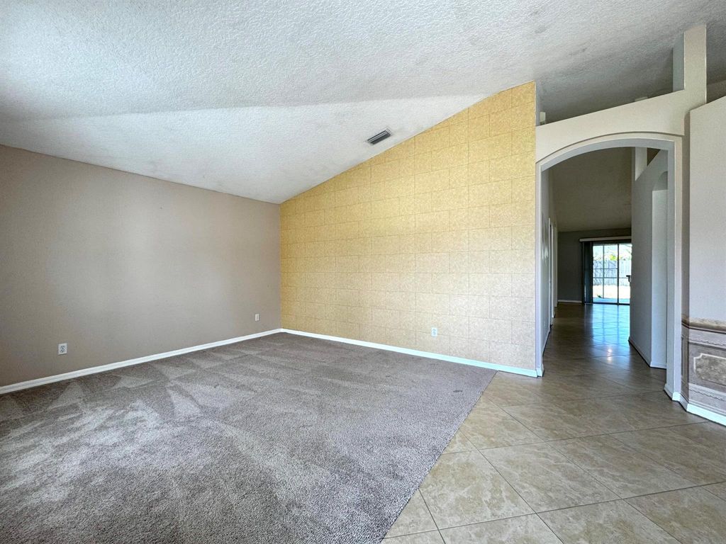 Photo of 484 SW Columbus Drive, Port Saint Lucie, FL 34953 (MLS # R11112958)