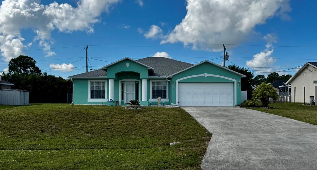 Photo of 484 SW Columbus Drive, Port Saint Lucie, FL 34953 (MLS # R11112958)