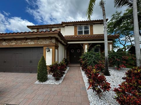Single Family Residence in Parkland FL 8661 Miralago Way.jpg