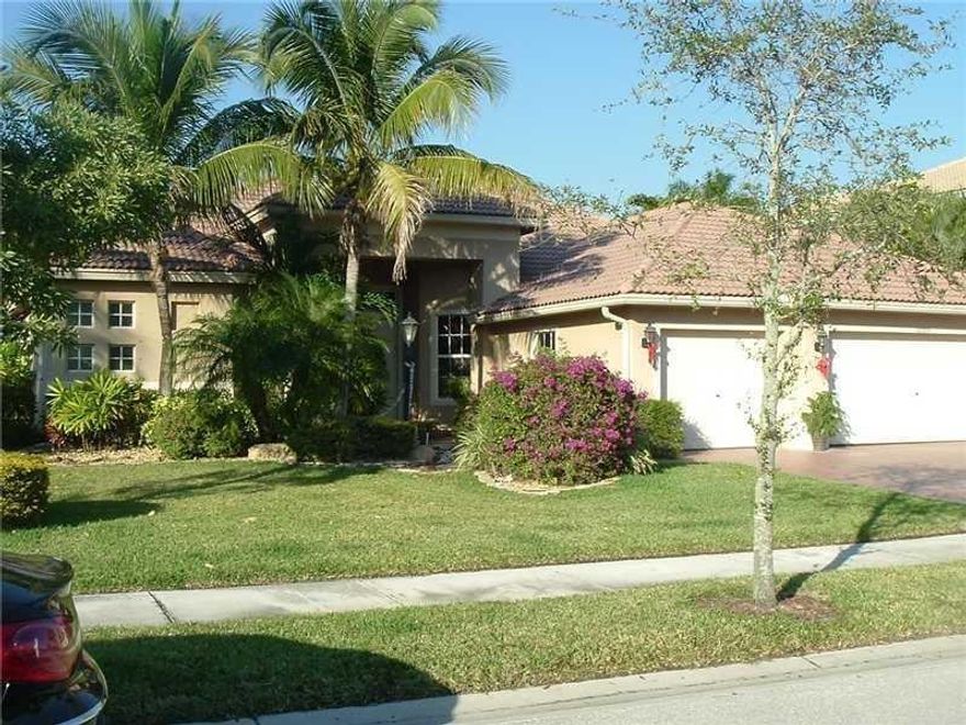 Located in the desirable Parkland Isles. This home boasts a large open floor plan with plenty of room. Fantastic private pool and patio area....perfect for entertaining. Open kitchen design, family room, formal living and dining rooms. A+ rated schools and major highways only minutes away. Must see to appreciate.