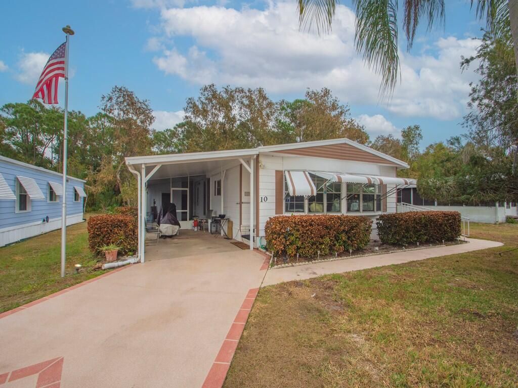 Photo of 10 Padre, Port Saint Lucie, FL 34952 (MLS # R11163867)