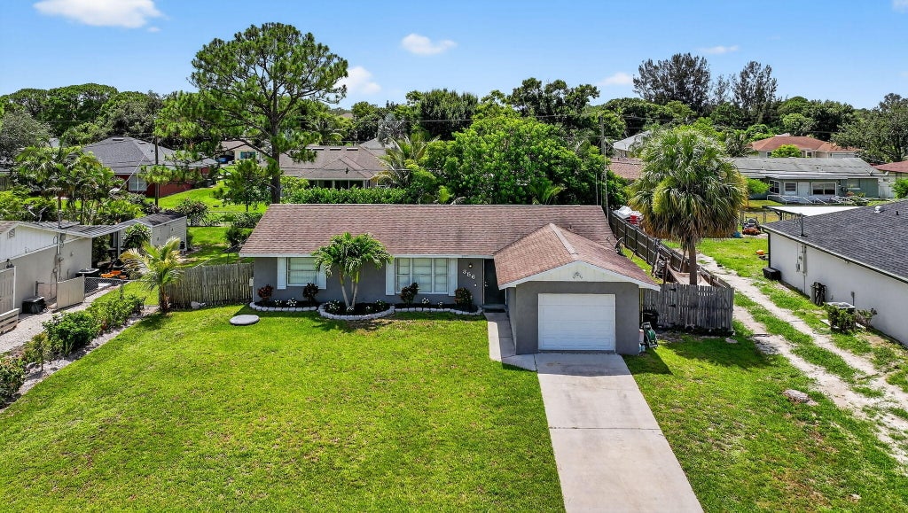 Photo of 356 NW Hibiscus Street, Port Saint Lucie, FL 34983 (MLS # R11103436)