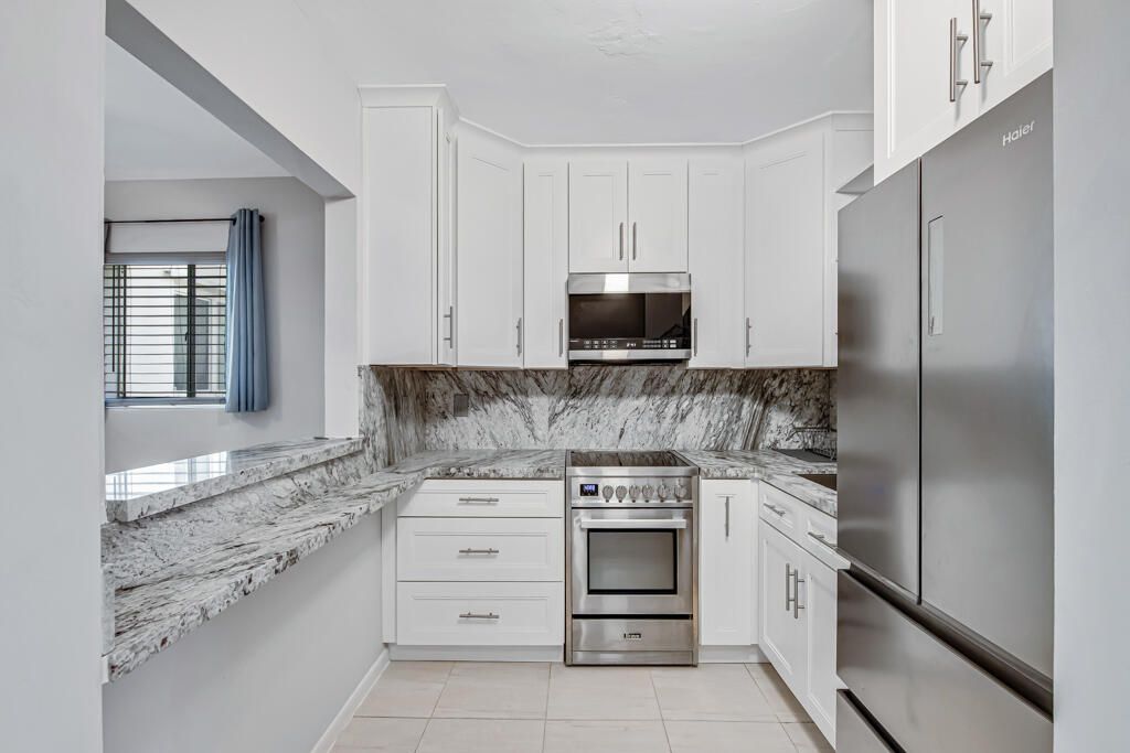 Photo of 2004 Lake Osborne Drive #4, Lake Worth Beach, FL 33461 (MLS # B26023201)