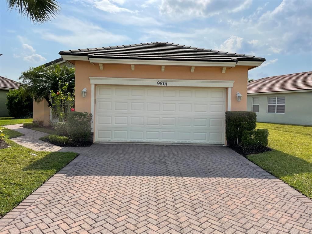 Photo of 9801 SW Eastbrook Circle, Port Saint Lucie, FL 34987 (MLS # R10709590)
