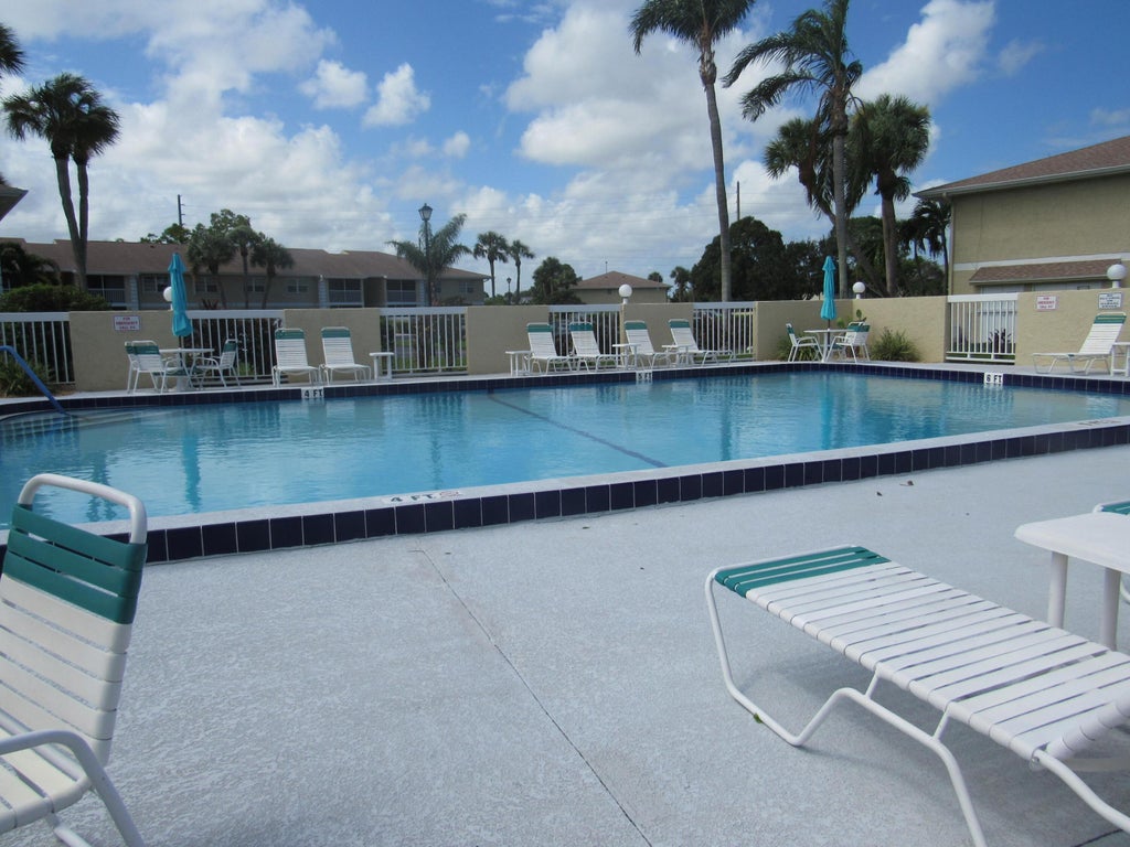 Photo of 1537 SE Royal Green Circle #202, Port Saint Lucie, FL 34952 (MLS # B26077701)