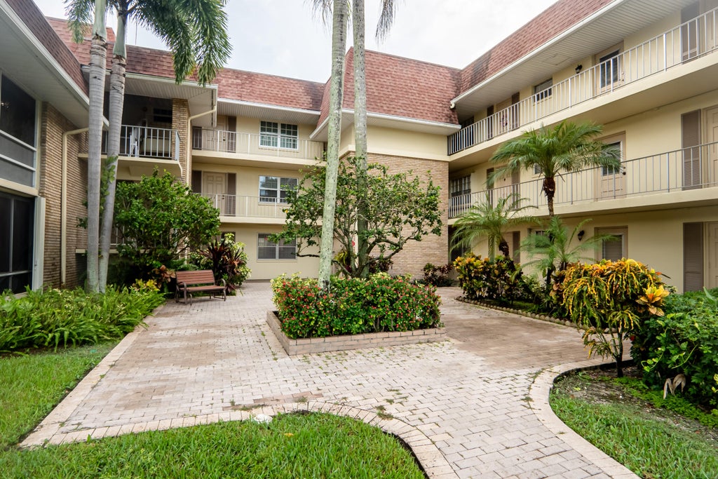 Photo of 5570 Tamberlane Circle #130, Palm Beach Gardens, FL 33418 (MLS # B26047303)