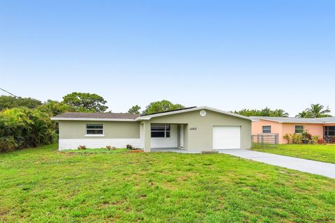 Photo of 1252 NE South Street, Jensen Beach, FL 34957 (MLS # R11108240)