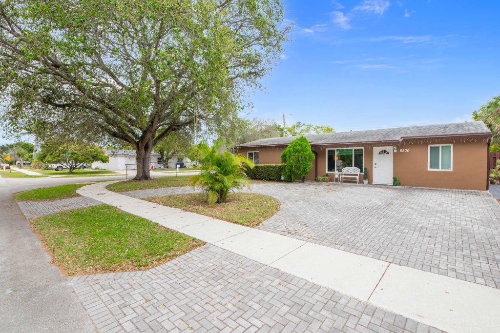 Photo of 6500 SW 16th Court, Pompano Beach, FL 33068 (MLS # B26064075)