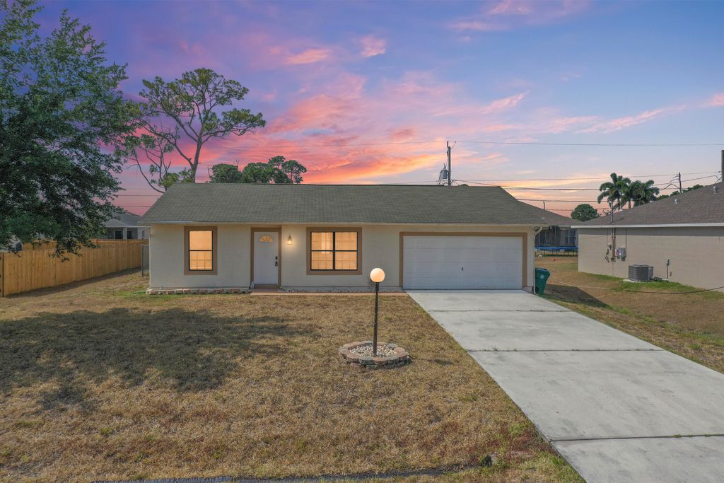 Photo of 630 SW Hoffenberg Avenue, Port Saint Lucie, FL 34953 (MLS # R10986342)