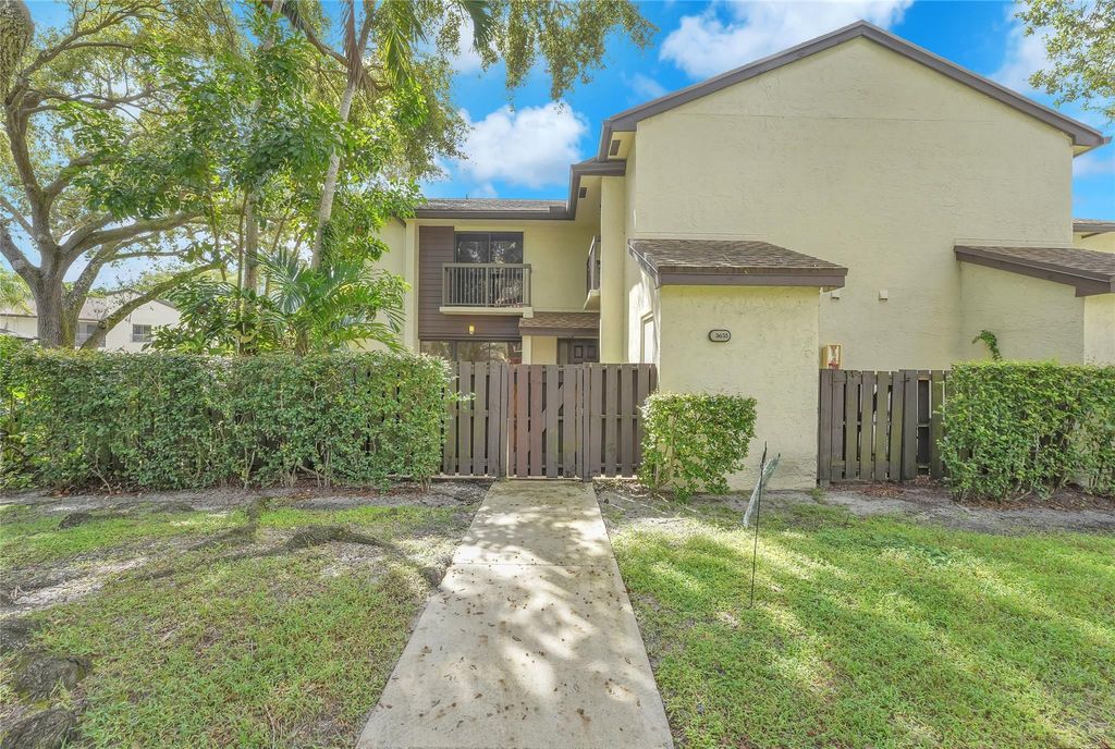 Photo of 3655 Cocoplum Cir, Coconut Creek, FL 33063 (MLS # F10402610)