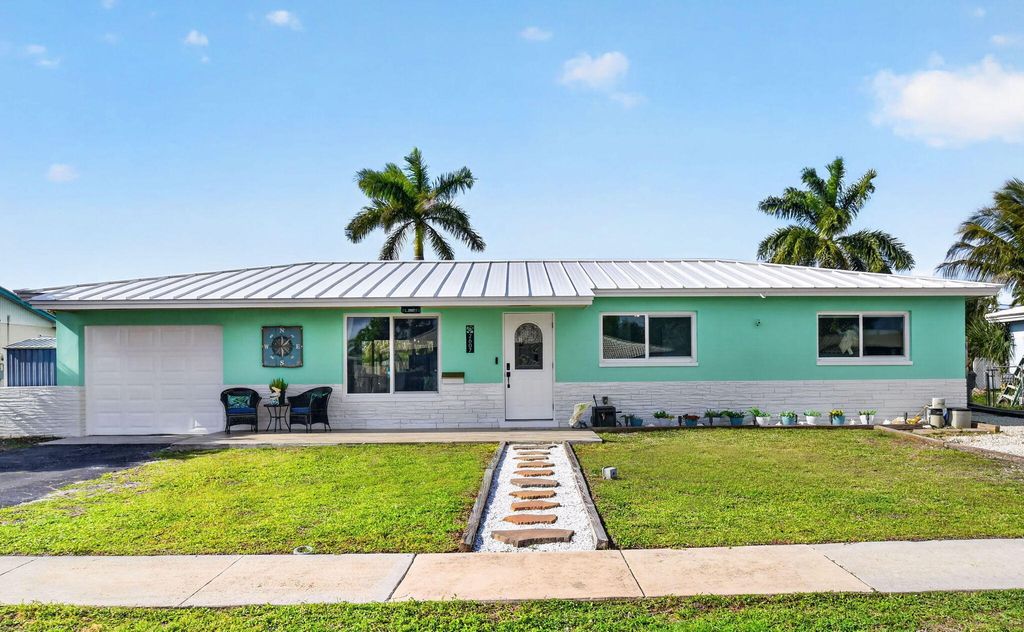 Photo of 2607 W End Road, West Palm Beach, FL 33406 (MLS # B26019790)