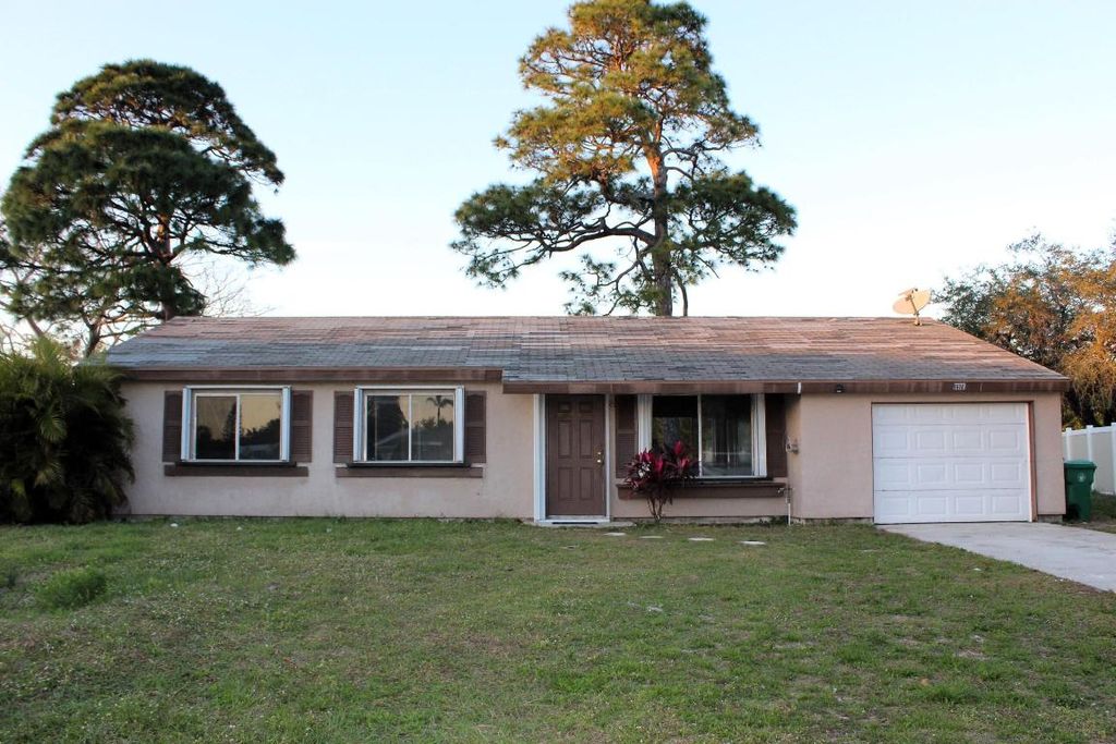 Photo of 1618 SE Elkhart Terrace, Port Saint Lucie, FL 34952 (MLS # R10955456)