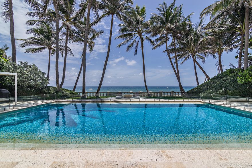 Magnificent direct oceanfront Palm Beach home with sprawling 125 feet of beach frontage. This one-of-a-kind estate is located near town on a quiet cul-de-sac street with a breathtaking backyard overlooking the Atlantic Ocean including outdoor loggia, beachside pool and cabana. Meticulous details throughout featuring soaring ceilings and grand scale rooms, luxurious master suite overlooking the pool and ocean,  4 en suite bedrooms, kitchen with breakfast area, and a temperature control wine cellar. Enjoy seaside living from this quintessential Palm Beach dream.