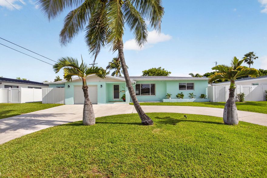 Welcome to this beautiful 3 Bed 2 Bath Home with garage and heated salt pool located in Pompano Beach. Located just off McNab and US-1, only 5 to 7 minutes from the beach. Step inside a bright and airy, open concept layout filled the natural light from multiple windows throughout.  Plenty of space to gather and entertain, with a seamless flow between the living room, dining area, and Florida sunroom, all overlooking the pool and lush backyard. The home features tile flooring throughout and a cohesive coastal inspired décor that perfectly complements the South Florida Beach Lifestyle. Hurricane impact windows all around. Roof installed in 2017. The kitchen features dark granite countertops, wood cabinetry, and stainless-steel appliances plus new refrigerator.  This home is serviced by Teco Peoples Gas which supplies natural gas, so you can enjoy a gas range, desirable feature in this area for those who love to cook. The primary bedroom suite has plenty of space for a king bed and additional furniture. Features two windows on two separate sides for abundant natural light.  Secondary bedroom is equally spacious, enough for bed, furniture, plus a desk. The second bathroom offers a spacious stand in shower with glass door, white countertop on vanity, large mirror and modern fixtures. The third bedroom features multiple windows for natural light, newly installed AC split, and its own private entrance and access to backyard.  Enjoy outdoor living year-round with a screened in outdoor patio overlooking the pool. The backyard is fully fenced in and offers exceptional privacy and ample space for outdoor activities & gardening. This heated saltwater pool can be used year-round. Enjoy the backyard year-round with space for outdoor dining, grilling, lounging in the sun...the perfect blend of comfort, functionality, and true South Florida living. Located 5-7 minutes from Pompano Beach's best attractions, including the famous Pompano Beach Pier and popular restaurants such as Beach House, Oceanic, Lucky Fish, and more.