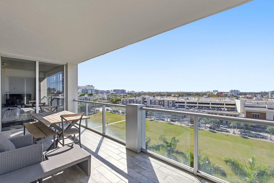 Exquisite 2BD/2BA residence in the heart of Midtown Miami with breathtaking skyline views and a highly desirable split dual-master layout. Features include floor-to-ceiling glass, 9-ft exposed concrete ceilings, elegant stone flooring, motorized blinds, and a custom chef's kitchen with dining island and many designer features. Enjoy an oversized private terrace with sleek glass railings, perfect for indoor-outdoor living. Offered FURNISHED or UNFURNISHED. Includes 1 assigned parking space. 2Midtown offers resort-style amenities including pool, hot tubs, fitness center, sauna, steam room, concierge, and secure garage. Prime location steps to Wynwood, Design District, shopping, dining, and entertainment with quick access to Brickell, Miami Beach, and the airport.