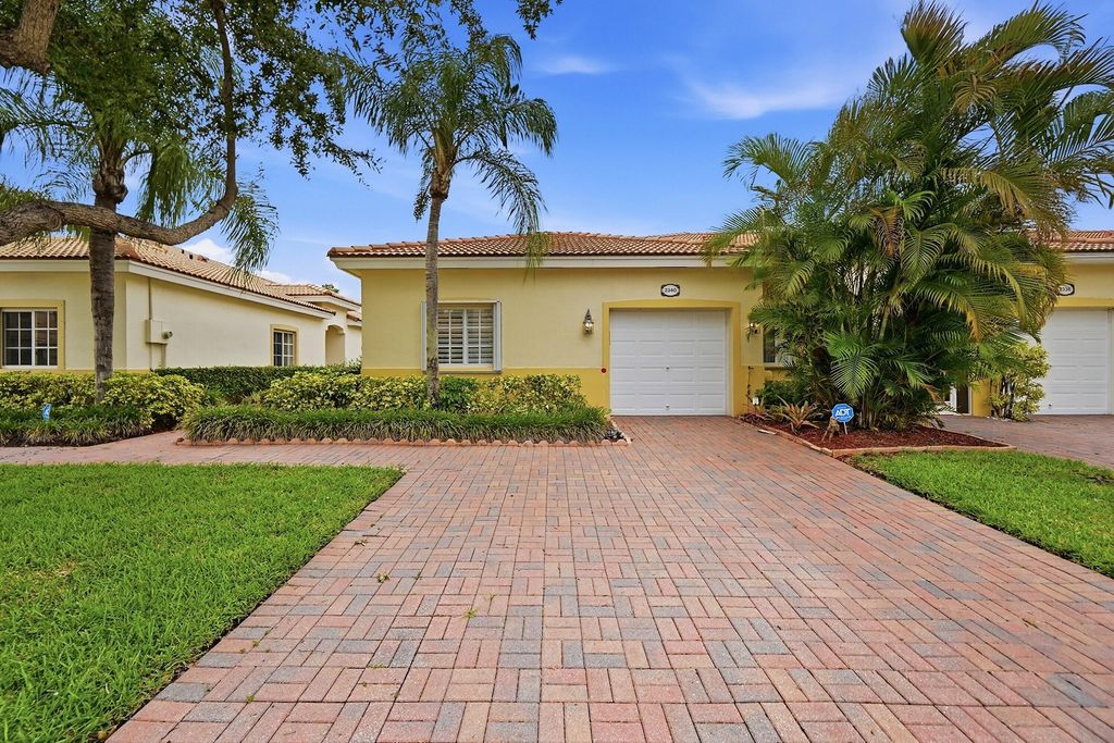 Photo of 2340 Windjammer Way, West Palm Beach, FL 33411 (MLS # B26039817)