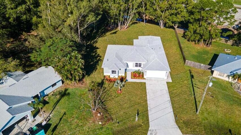 Photo of 419 SW Namoit Place, Port Saint Lucie, FL 34953 (MLS # R11112764)