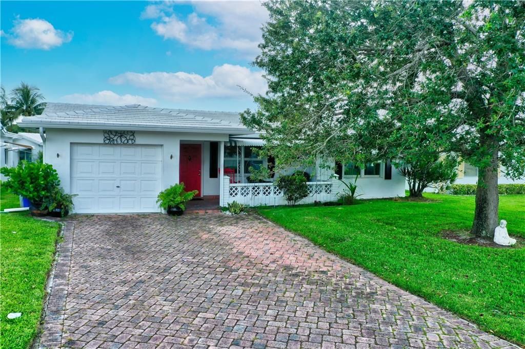 Photo of 220 S Golf Blvd, Pompano Beach, FL 33064 (MLS # F10329709)